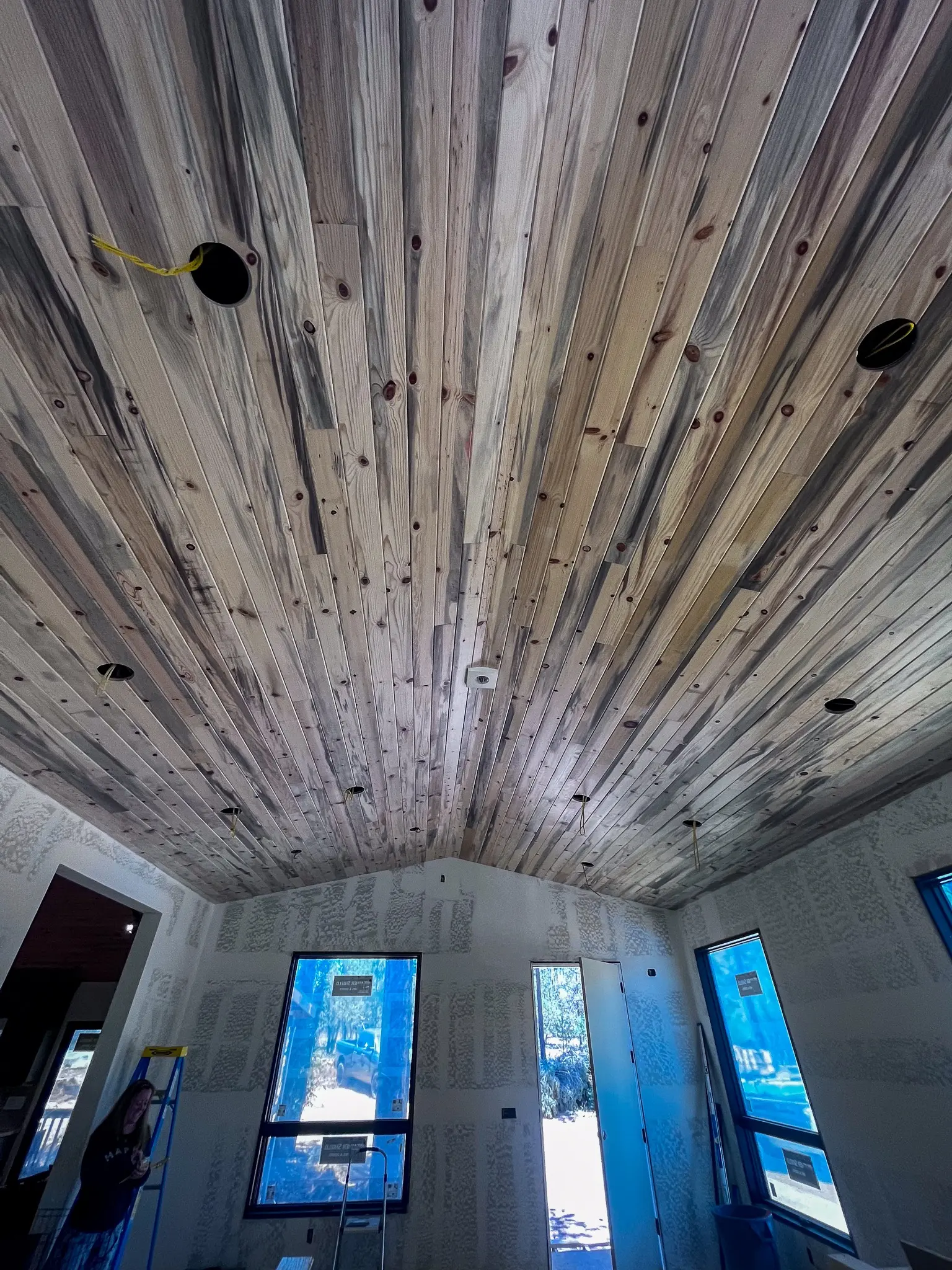Weathered timber ceiling with hanging lights