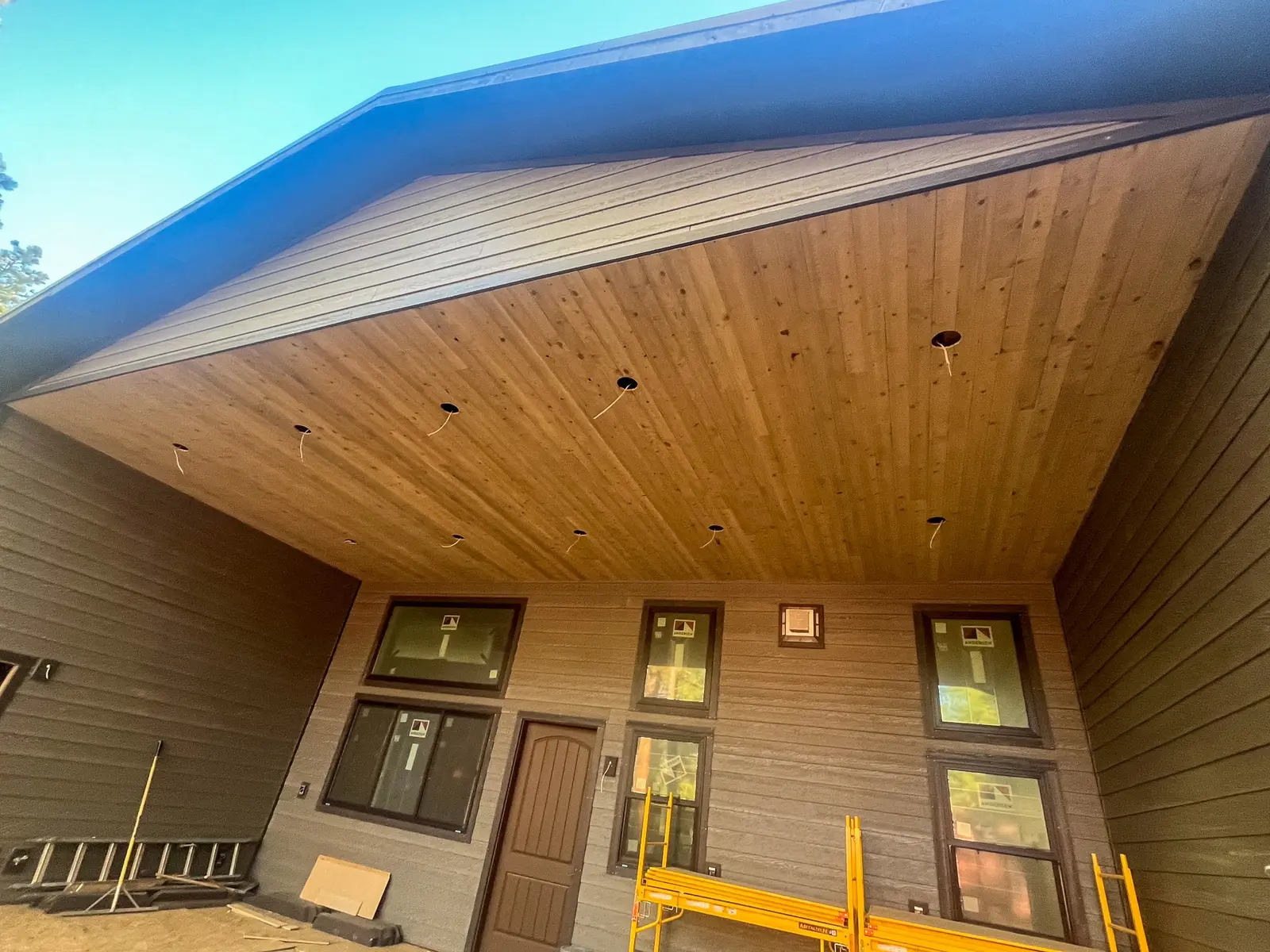 Timber patio ceiling with lights and brackets